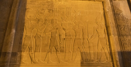 Drawings inside the Kom Ombo temple at night illuminated